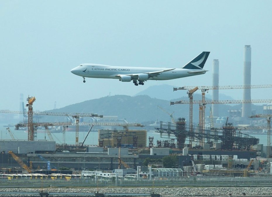 Cathay Pacific freighter passing the Hong Kong Terminal 2 Expansion Project